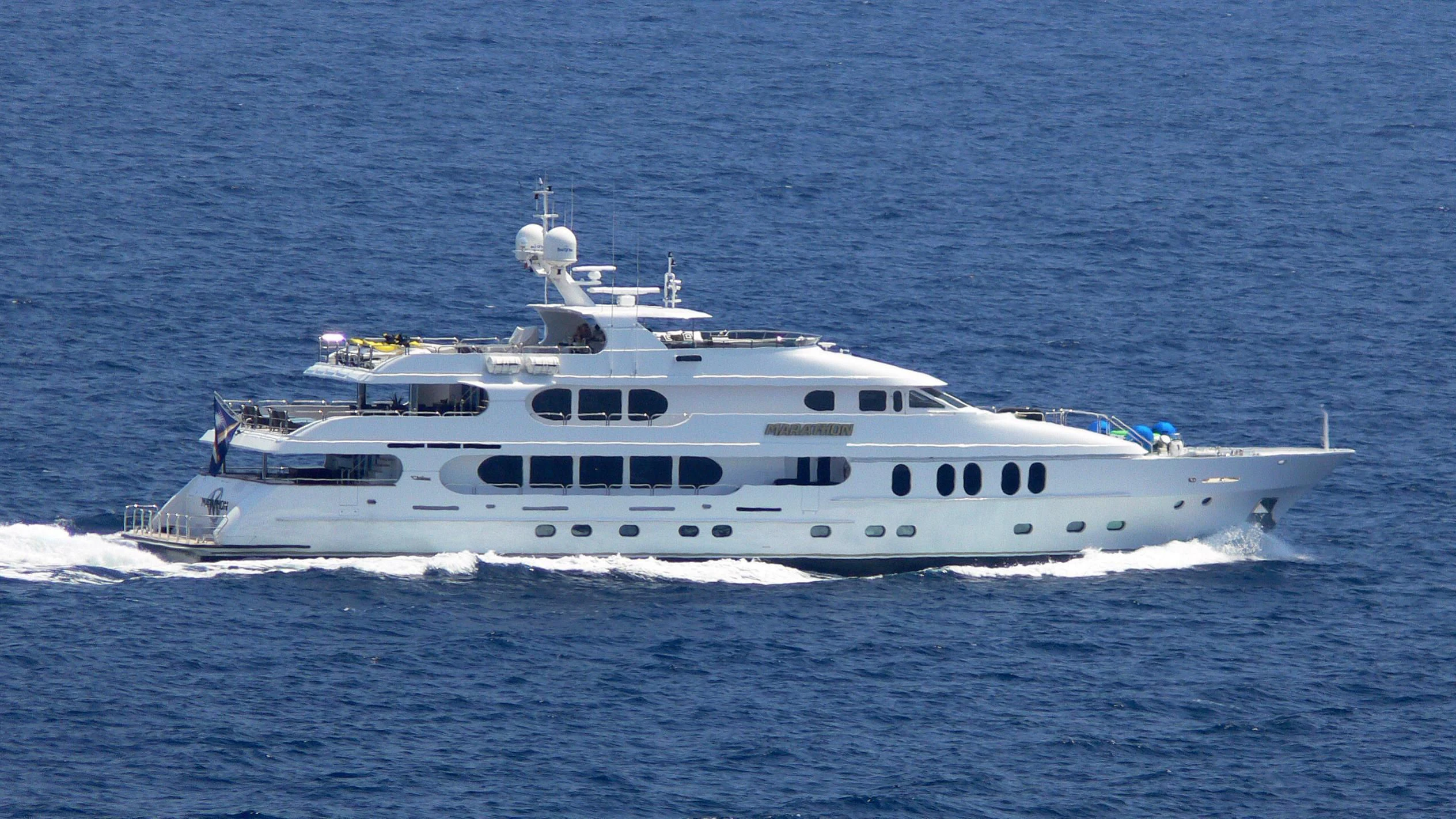 a white yacht in the water aboard NO COMMENT Yacht for Sale