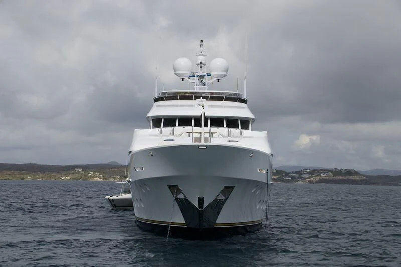 a large white ship in the water aboard NO COMMENT Yacht for Sale