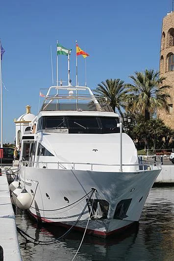 a boat docked in a harbor aboard NEEVEEN Yacht for Sale
