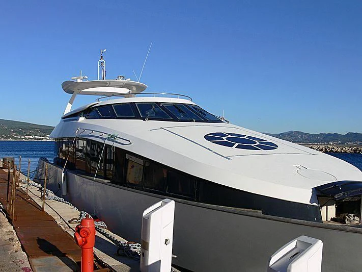 a boat on a dock aboard L'OR Yacht for Sale