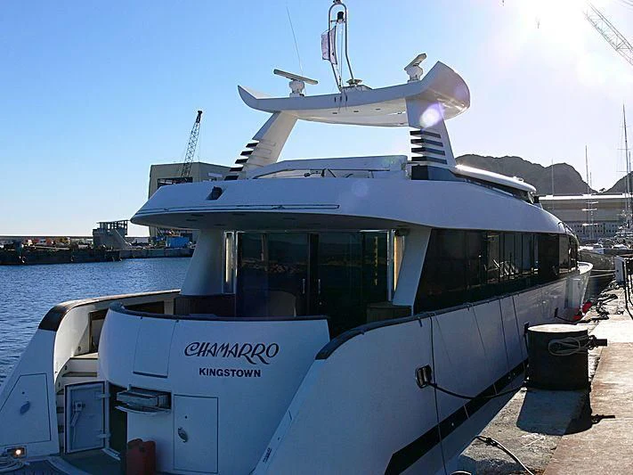 a boat docked at a pier aboard L'OR Yacht for Sale