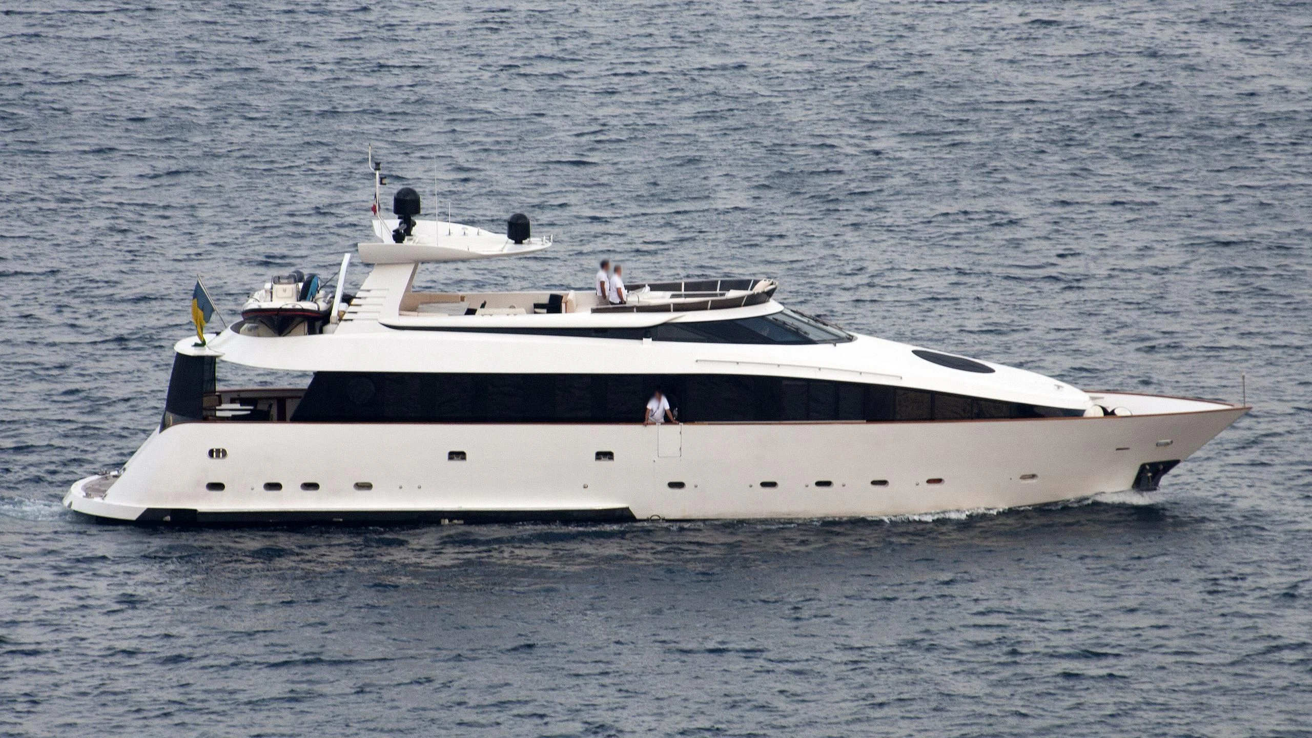 a white yacht in the water aboard L'OR Yacht for Sale
