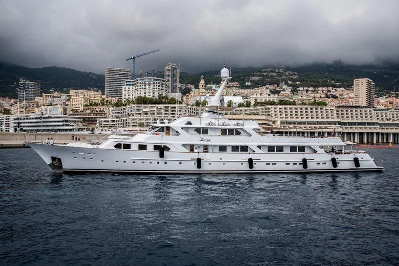 a white yacht in the water aboard MIRAGE Yacht for Sale