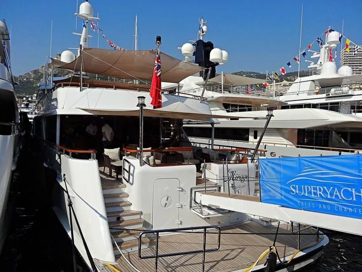 a boat docked at a pier aboard MIRAGE Yacht for Sale