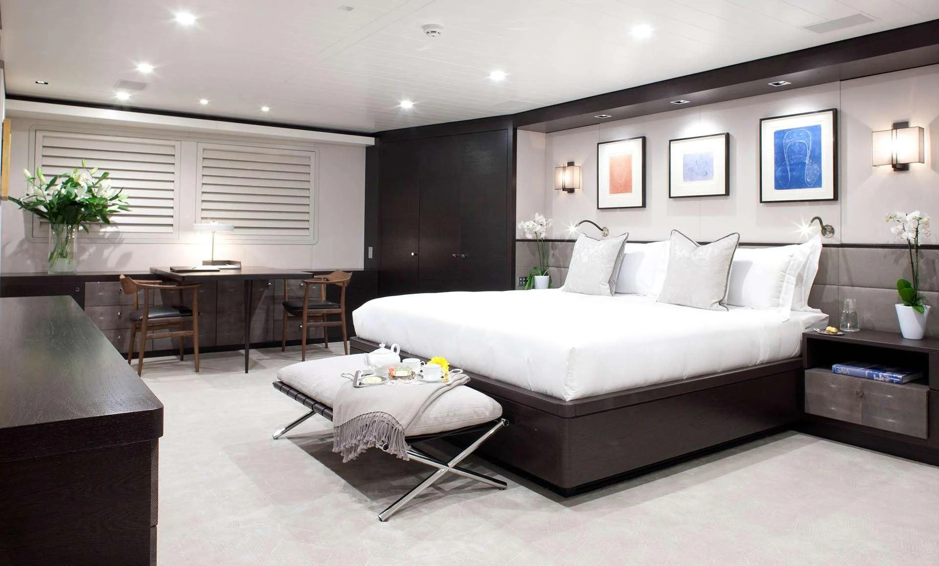 a large white bed in a room aboard MIRAGE Yacht for Sale