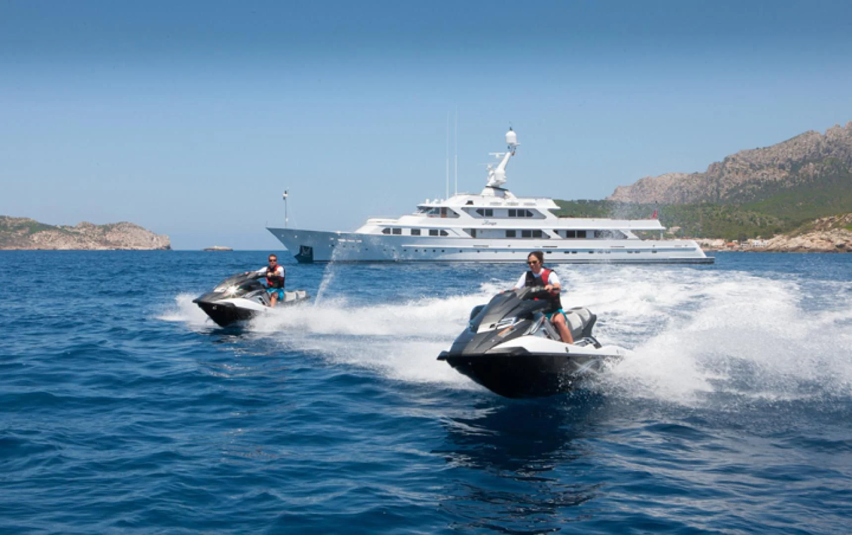 a boat with a person on it aboard MIRAGE Yacht for Sale