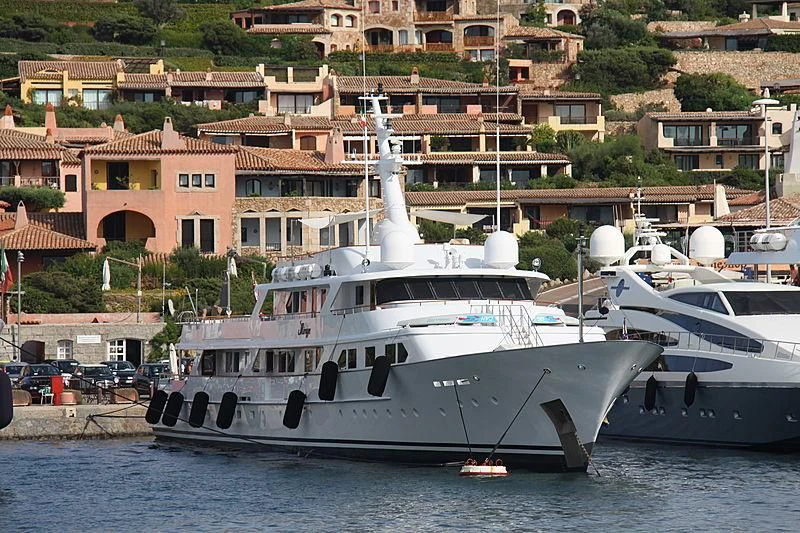 a boat docked at a pier aboard MIRAGE Yacht for Sale