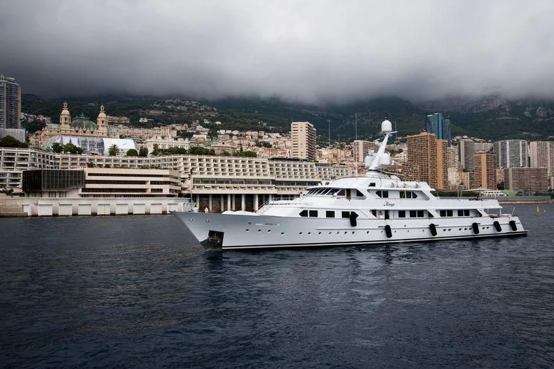 a white yacht in the water aboard MIRAGE Yacht for Sale