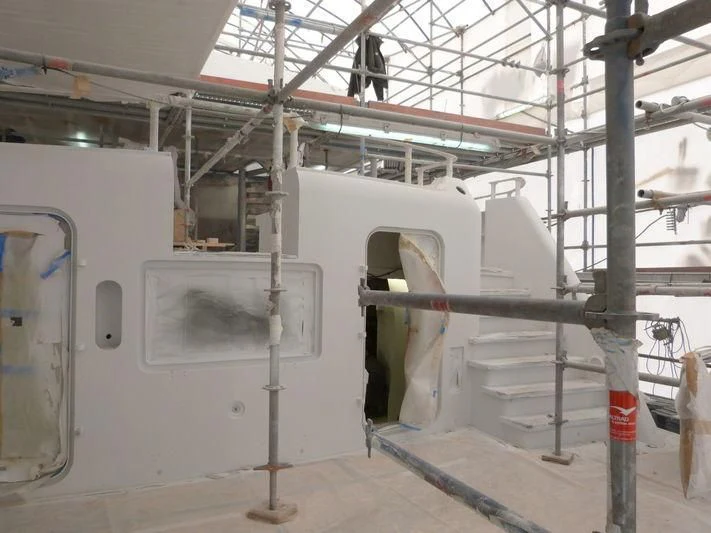 a large factory with white machines aboard MIRAGE Yacht for Sale