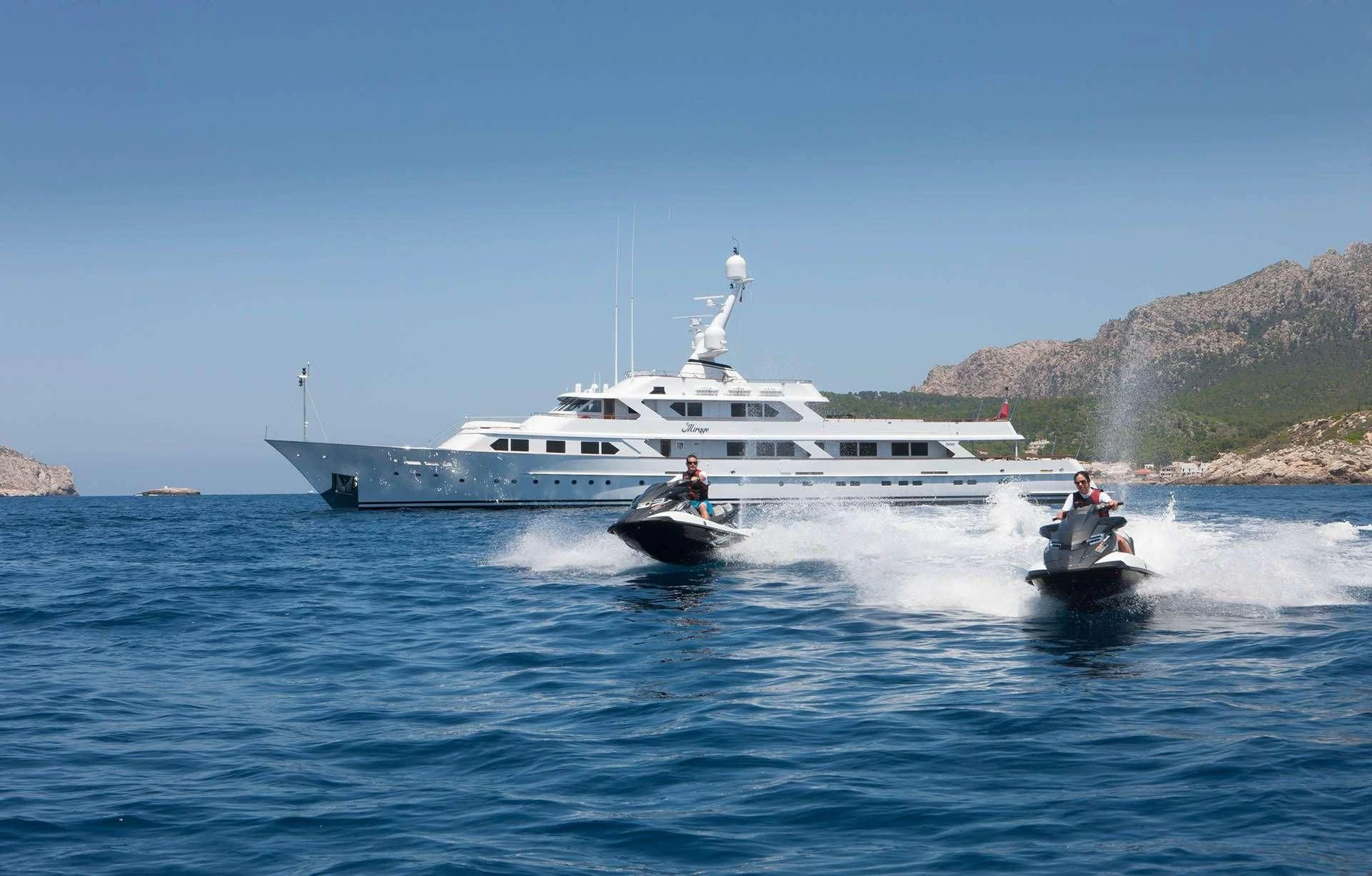 a couple of people on a boat aboard MIRAGE Yacht for Sale