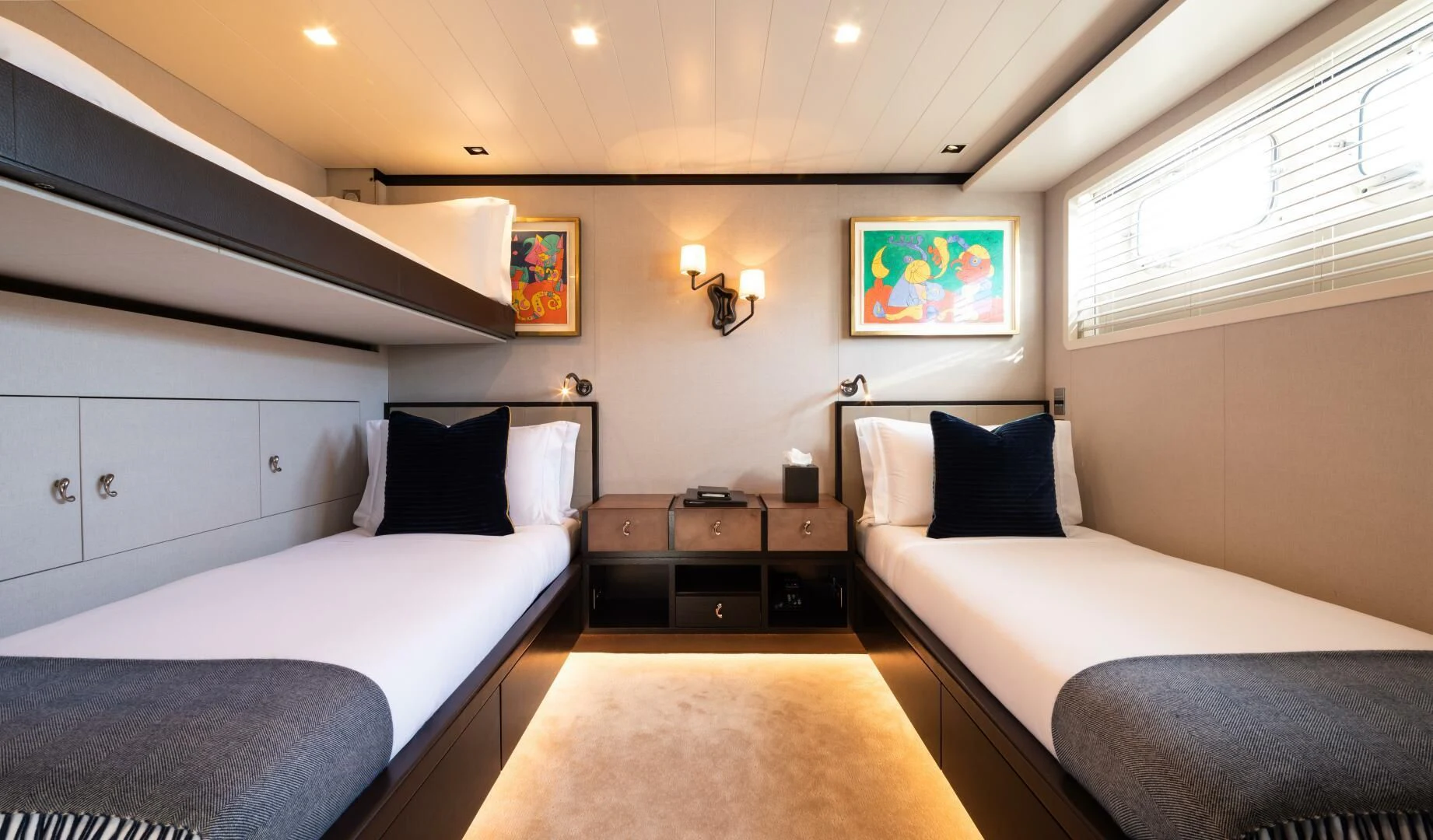 a room with two beds aboard MIRAGE Yacht for Sale