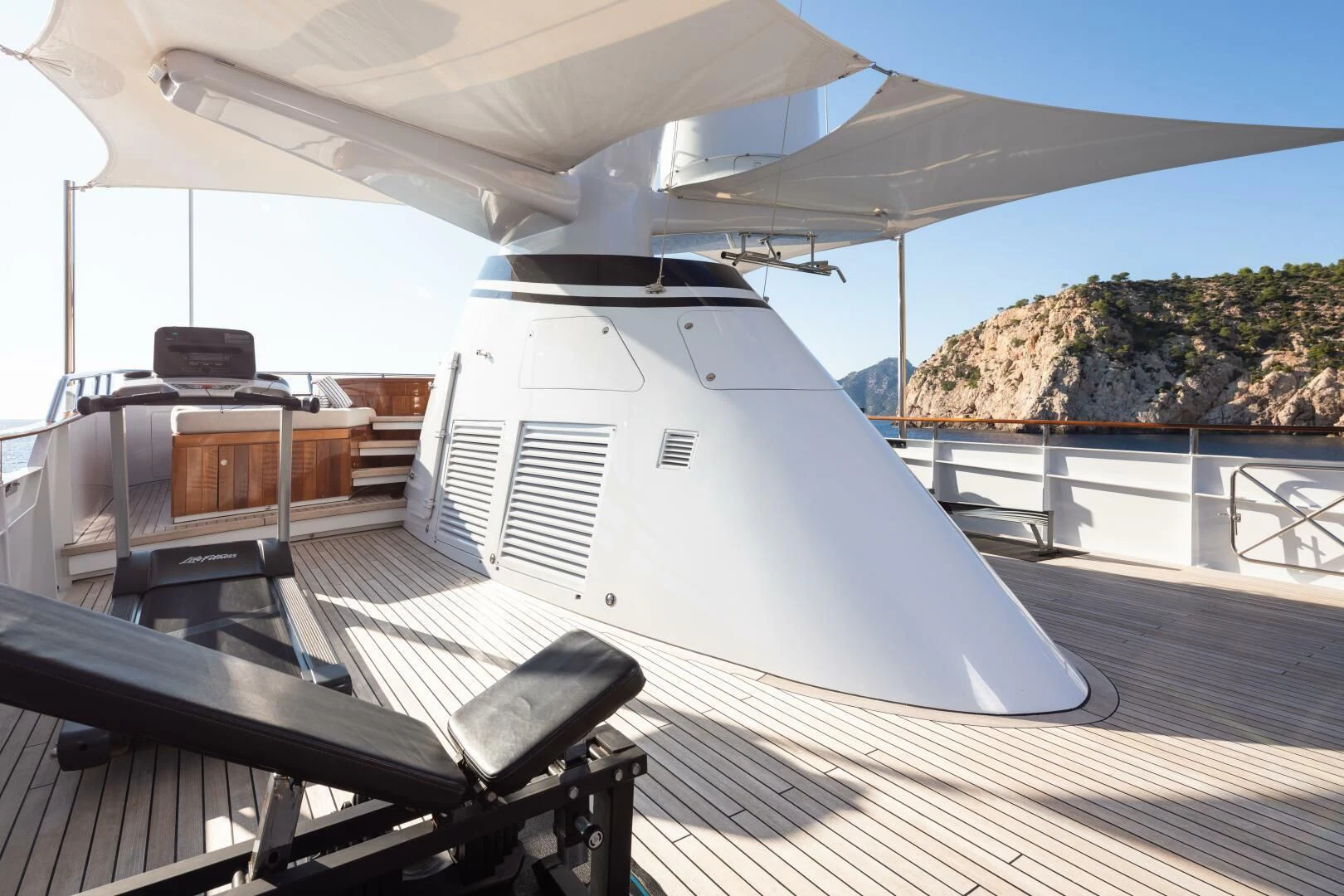 a boat on a deck aboard MIRAGE Yacht for Sale