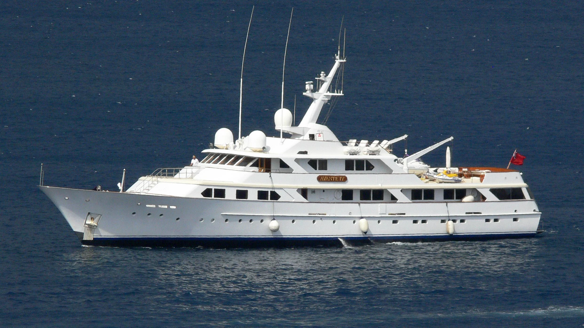 a white yacht in the water aboard MIRAGE Yacht for Sale