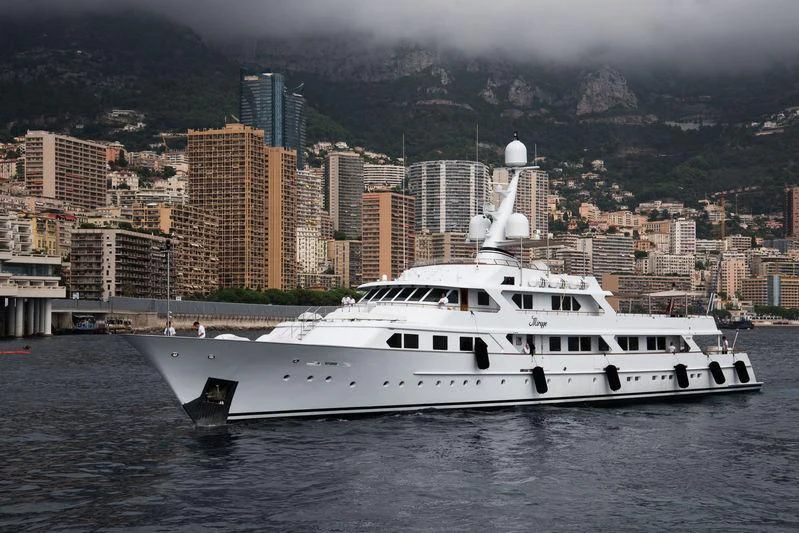 a white yacht in the water aboard MIRAGE Yacht for Sale