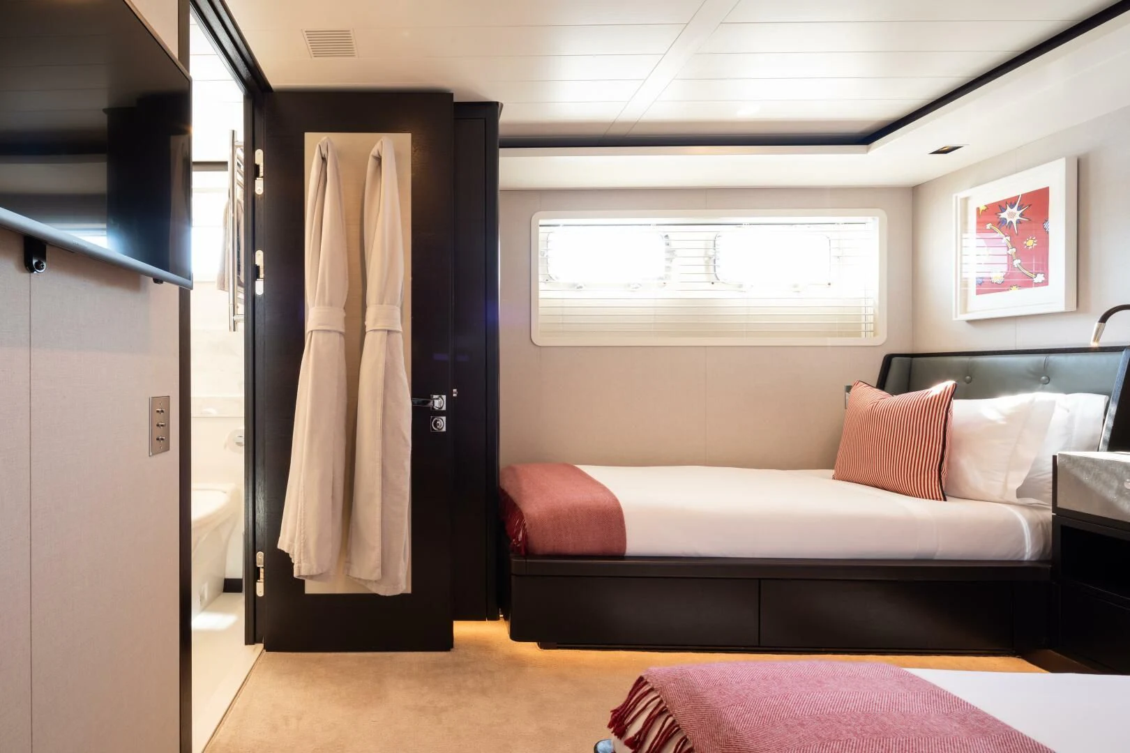 a bed in a room aboard MIRAGE Yacht for Sale