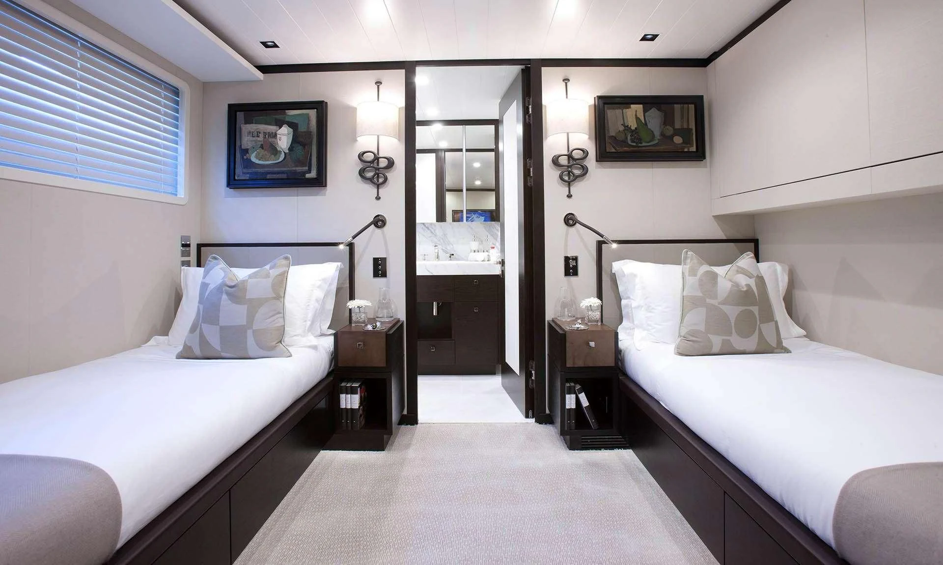 a room with two beds aboard MIRAGE Yacht for Sale