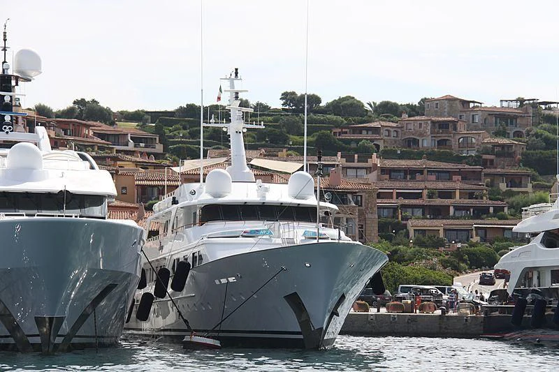 a boat docked at a pier aboard MIRAGE Yacht for Sale