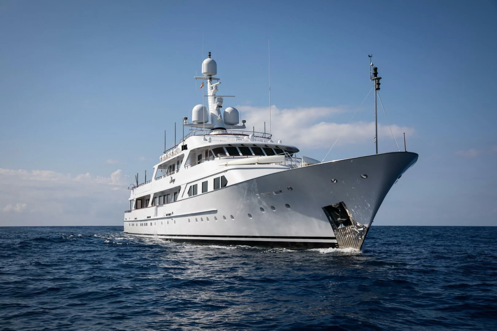 a white boat in the water aboard MIRAGE Yacht for Sale