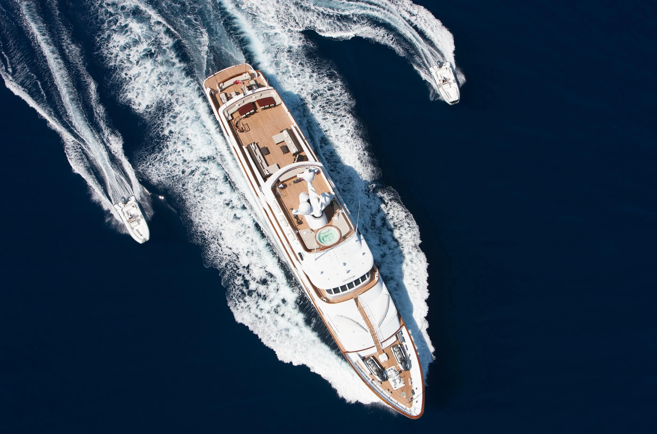 a toy ship on a blanket aboard MIRAGE Yacht for Sale