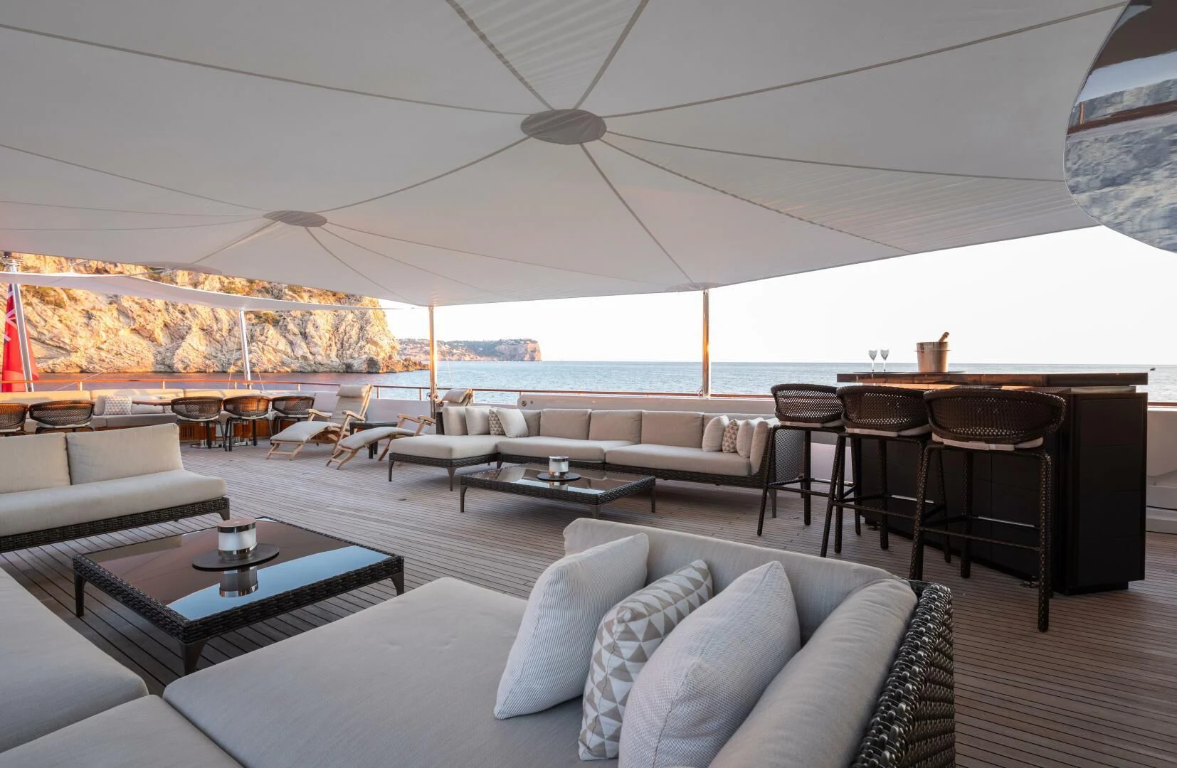 a living room with a large patio aboard MIRAGE Yacht for Sale