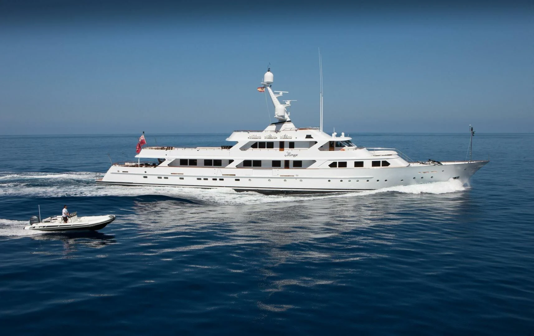 a white boat in the water aboard MIRAGE Yacht for Sale