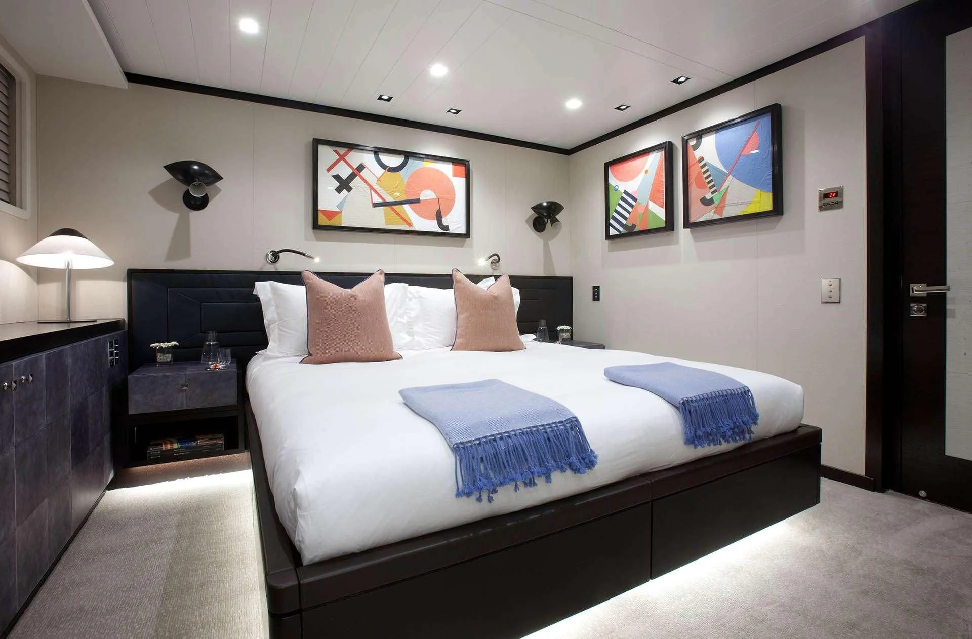 a bed in a hotel room aboard MIRAGE Yacht for Sale