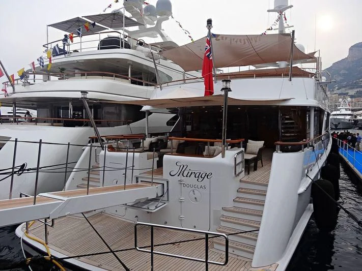 a boat docked at a pier aboard MIRAGE Yacht for Sale