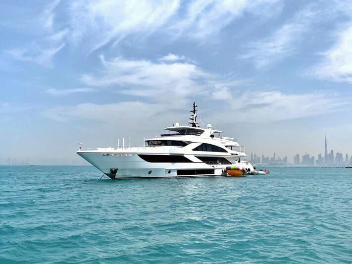 a white yacht in the water aboard NASHWAN Yacht for Sale