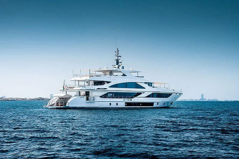 a white yacht in the water aboard NASHWAN Yacht for Sale