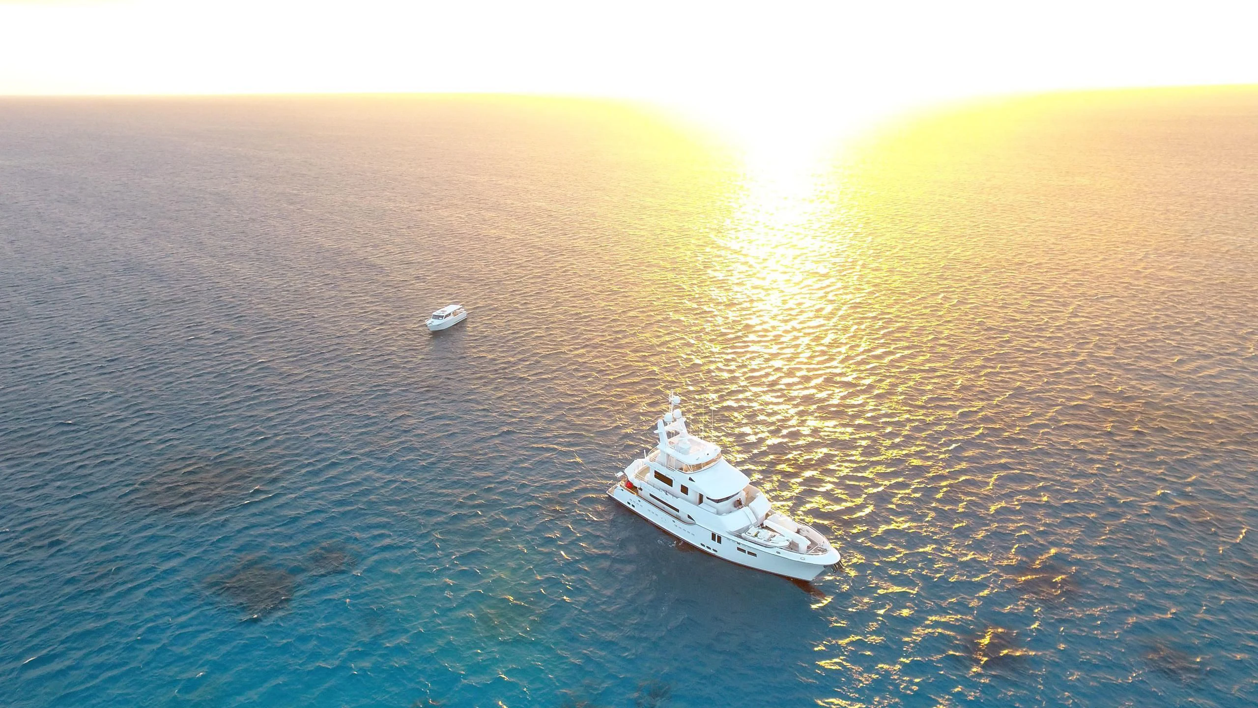 a couple of boats in the water aboard SALVATORE II Yacht for Sale