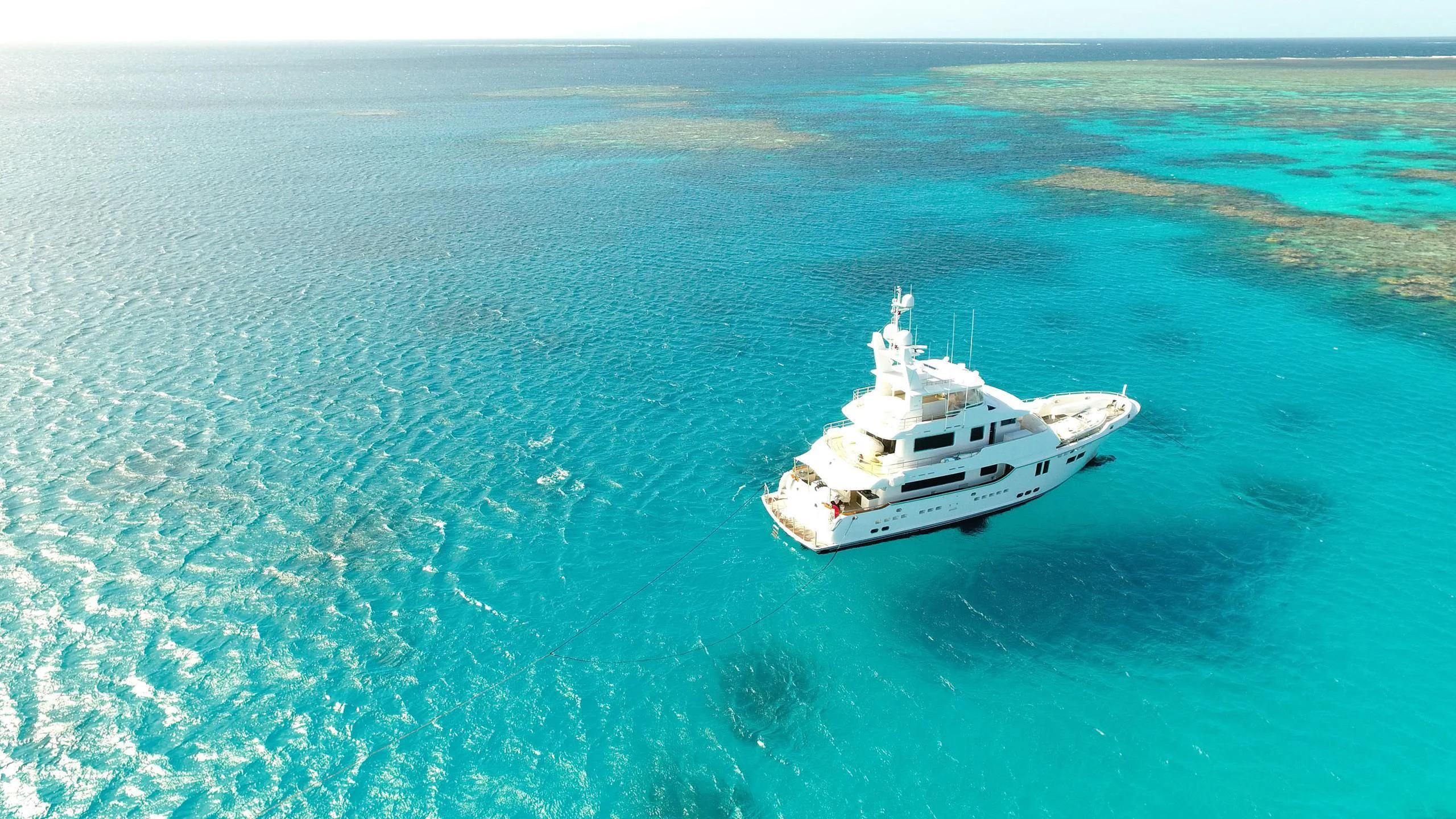 a white boat in the water aboard SALVATORE II Yacht for Sale