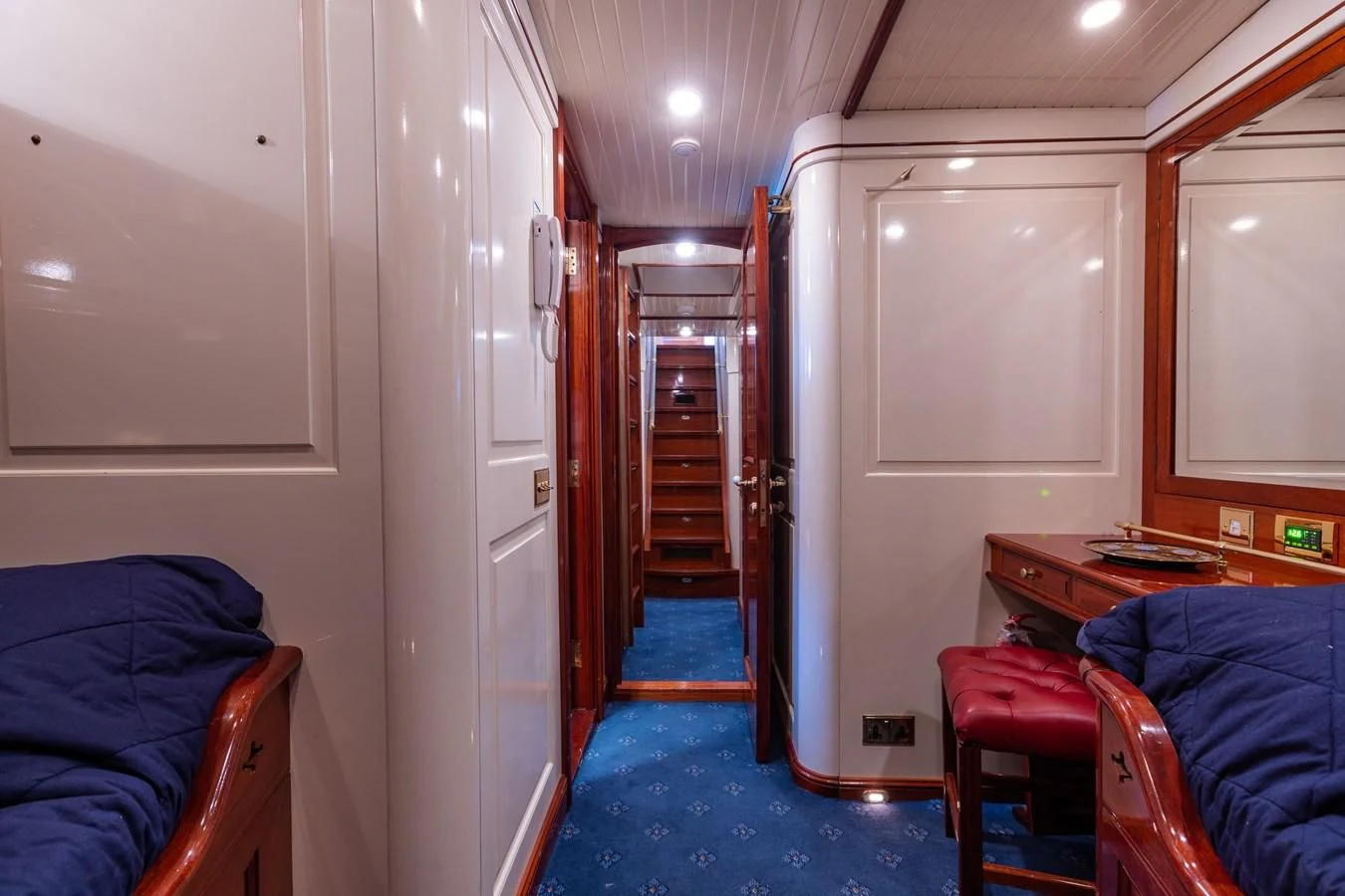 a hallway with chairs and a door aboard FREDRIKSTAD Yacht for Sale