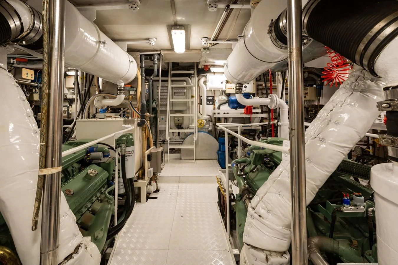 a room with white machines aboard FREDRIKSTAD Yacht for Sale