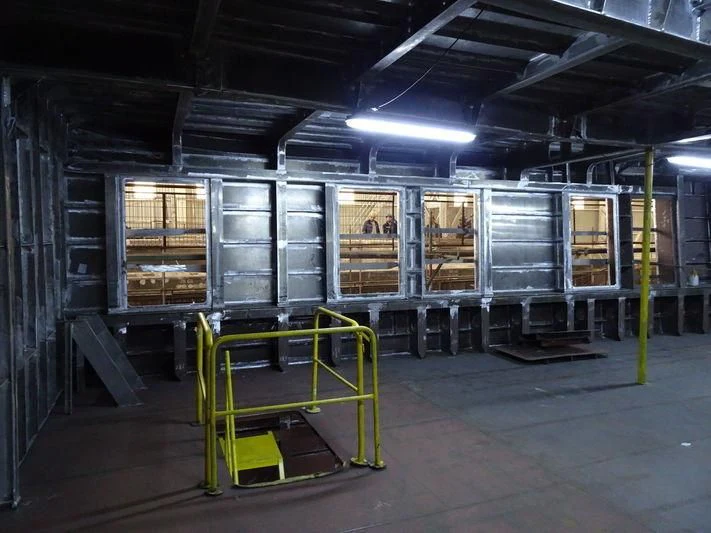 a warehouse with shelves and shelves aboard ROE Yacht for Sale