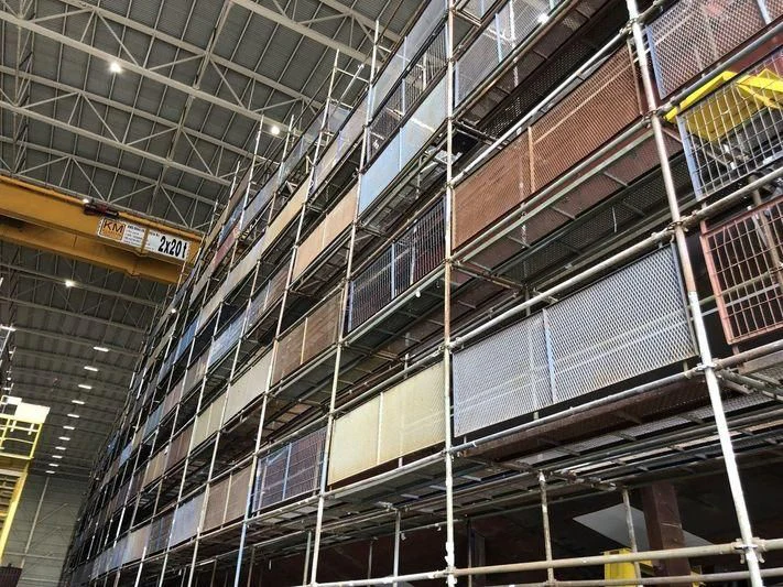 a large building with many windows aboard ROE Yacht for Sale