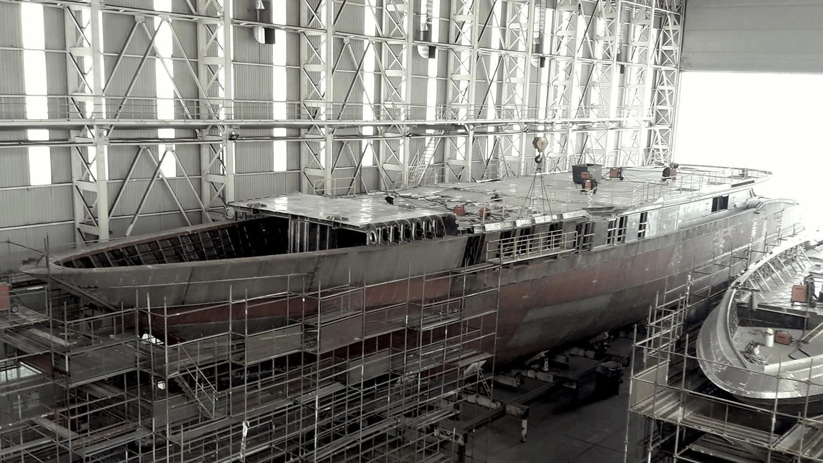 a large metal factory aboard ROE Yacht for Sale