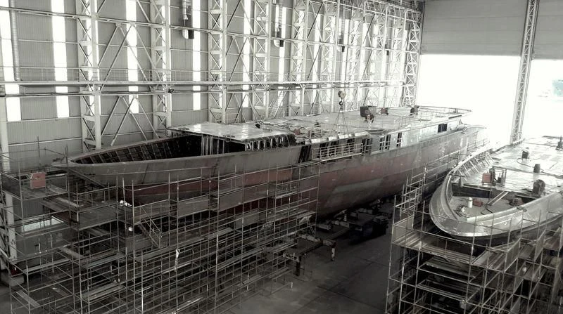 a large factory with many machines aboard ROE Yacht for Sale