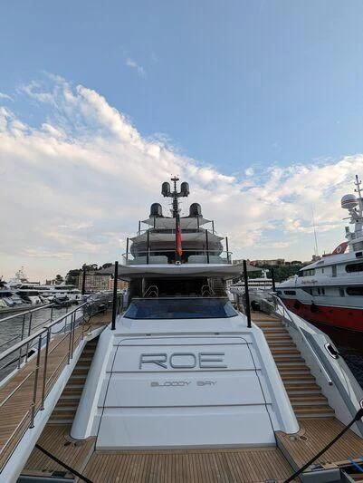 a boat in a harbor aboard ROE Yacht for Sale