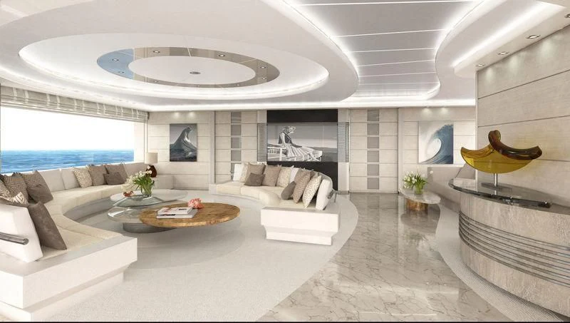 a modern living room with a large white sofa and a round table aboard ROE Yacht for Sale