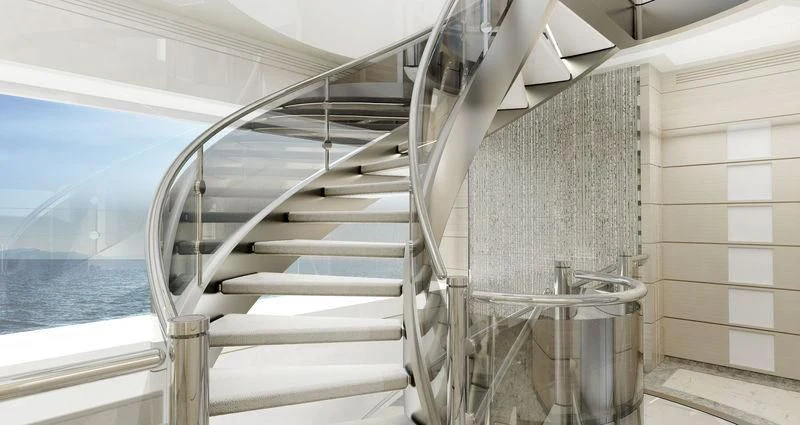 a staircase with a glass wall aboard ROE Yacht for Sale