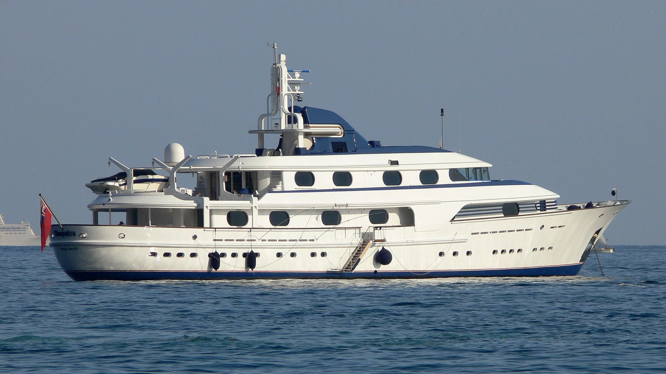 a white yacht on the water aboard CLEOPATRA Yacht for Sale