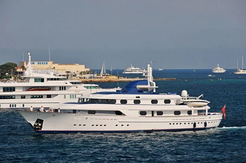 a large white boat in the water aboard CLEOPATRA Yacht for Sale