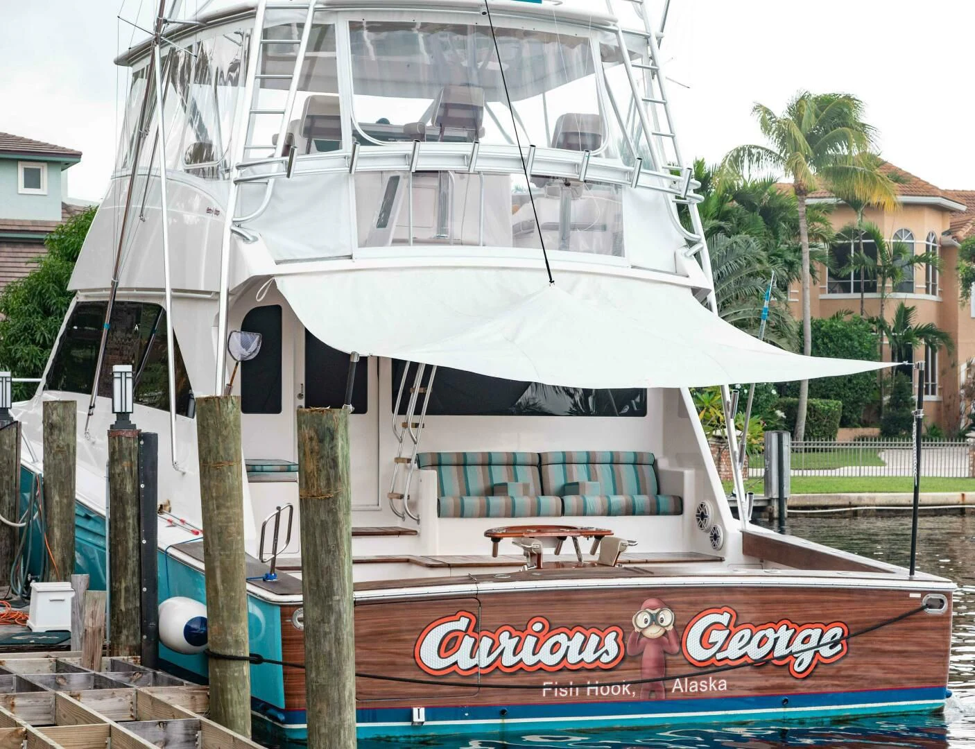 a boat in a glass case aboard CURIOUS GEORGE Yacht for Sale