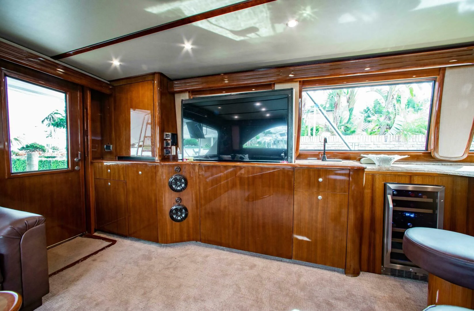 a room with wooden cabinets aboard CURIOUS GEORGE Yacht for Sale