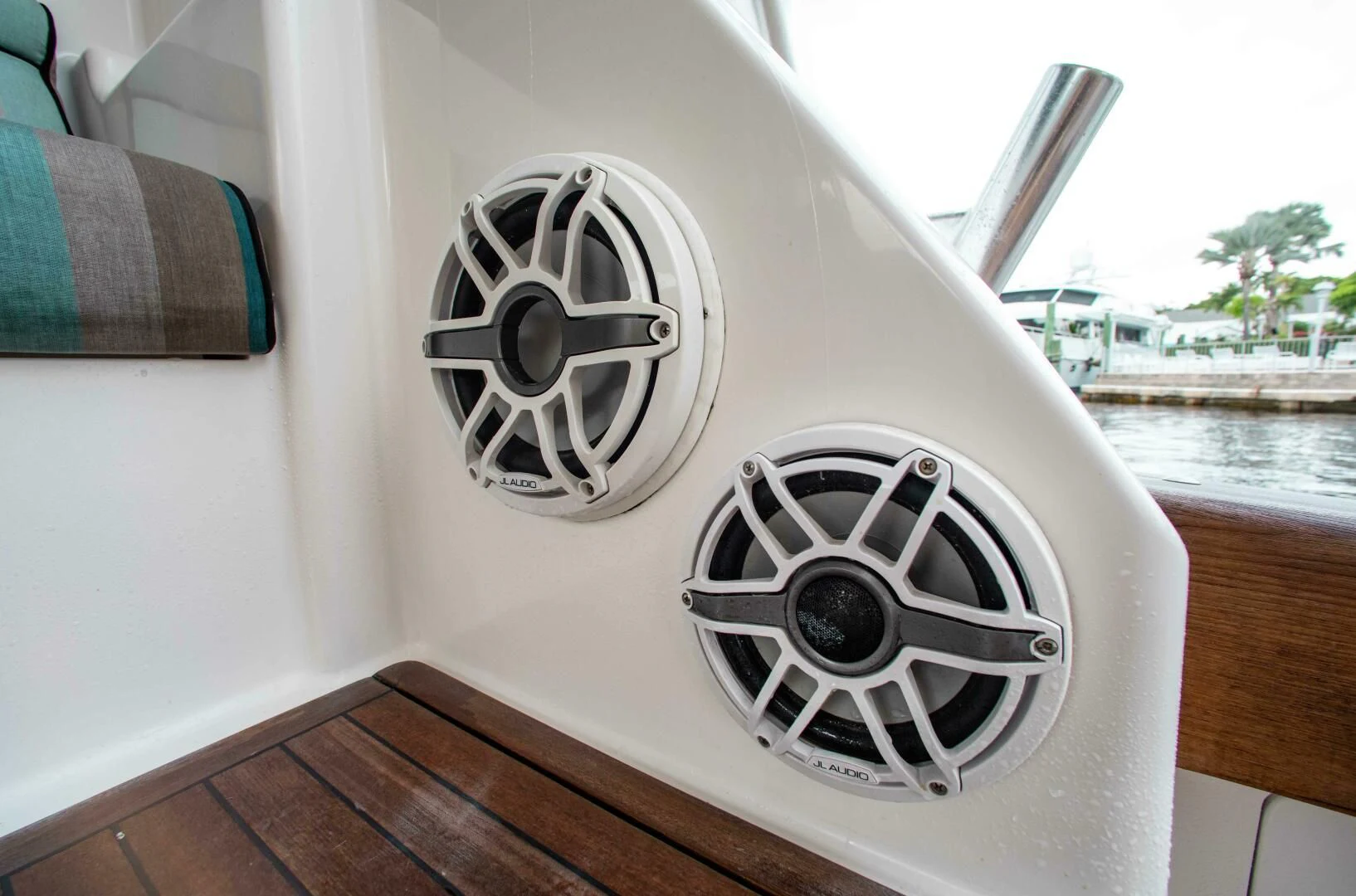 a white car with a large wheel aboard CURIOUS GEORGE Yacht for Sale