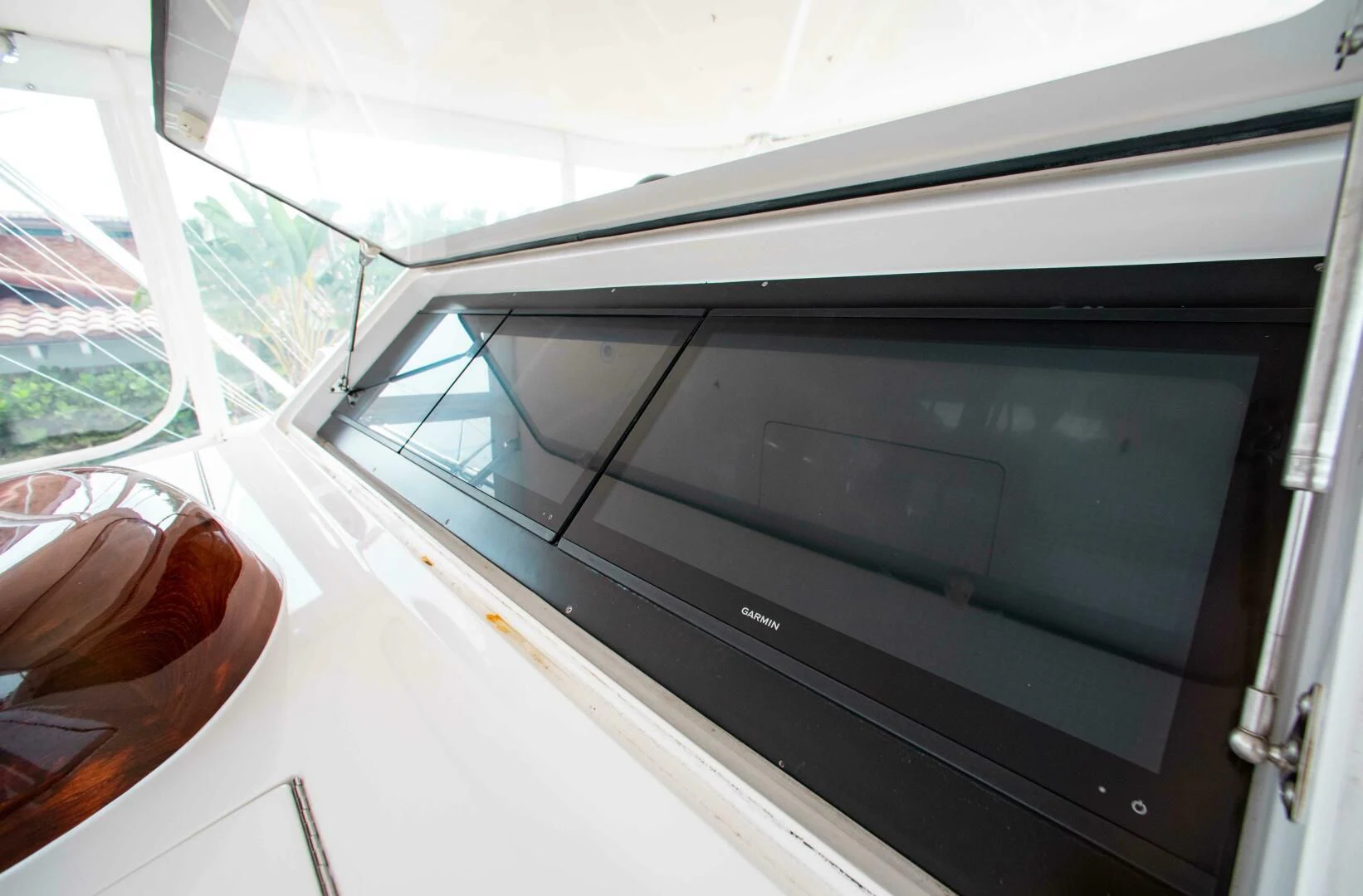 a black television on a white table aboard CURIOUS GEORGE Yacht for Sale