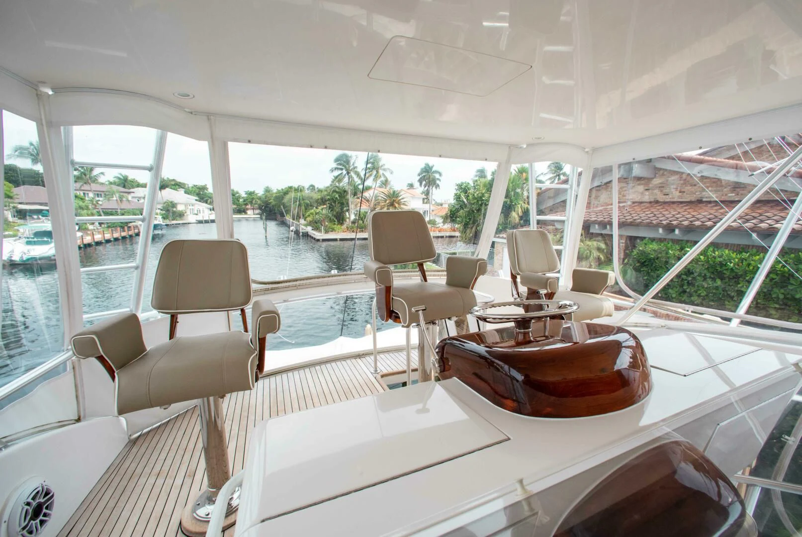 a table with chairs on it aboard CURIOUS GEORGE Yacht for Sale
