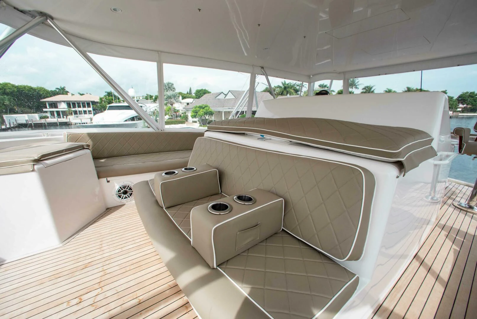a large white bed with a white sheet on it aboard CURIOUS GEORGE Yacht for Sale