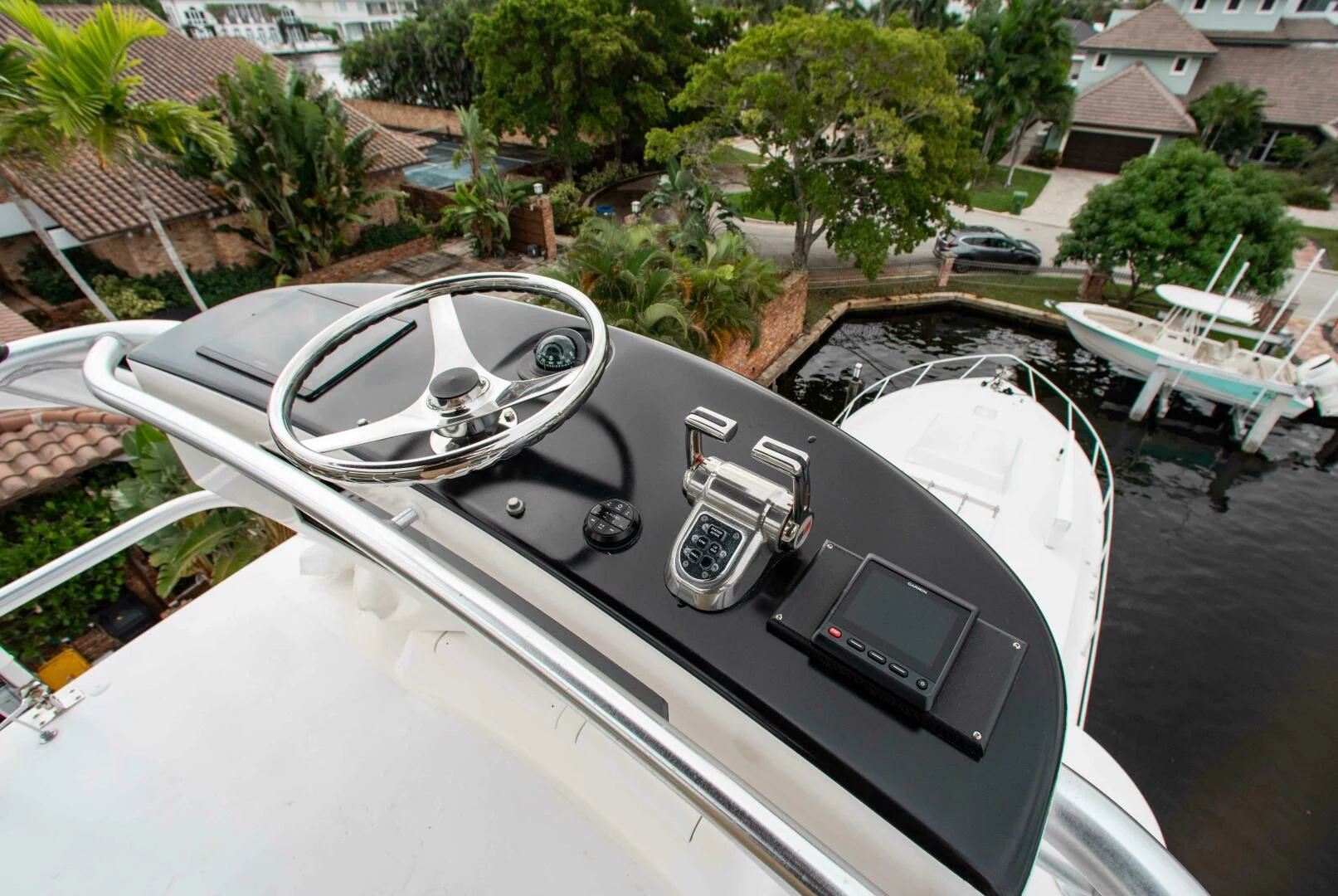 a car with a steering wheel aboard CURIOUS GEORGE Yacht for Sale