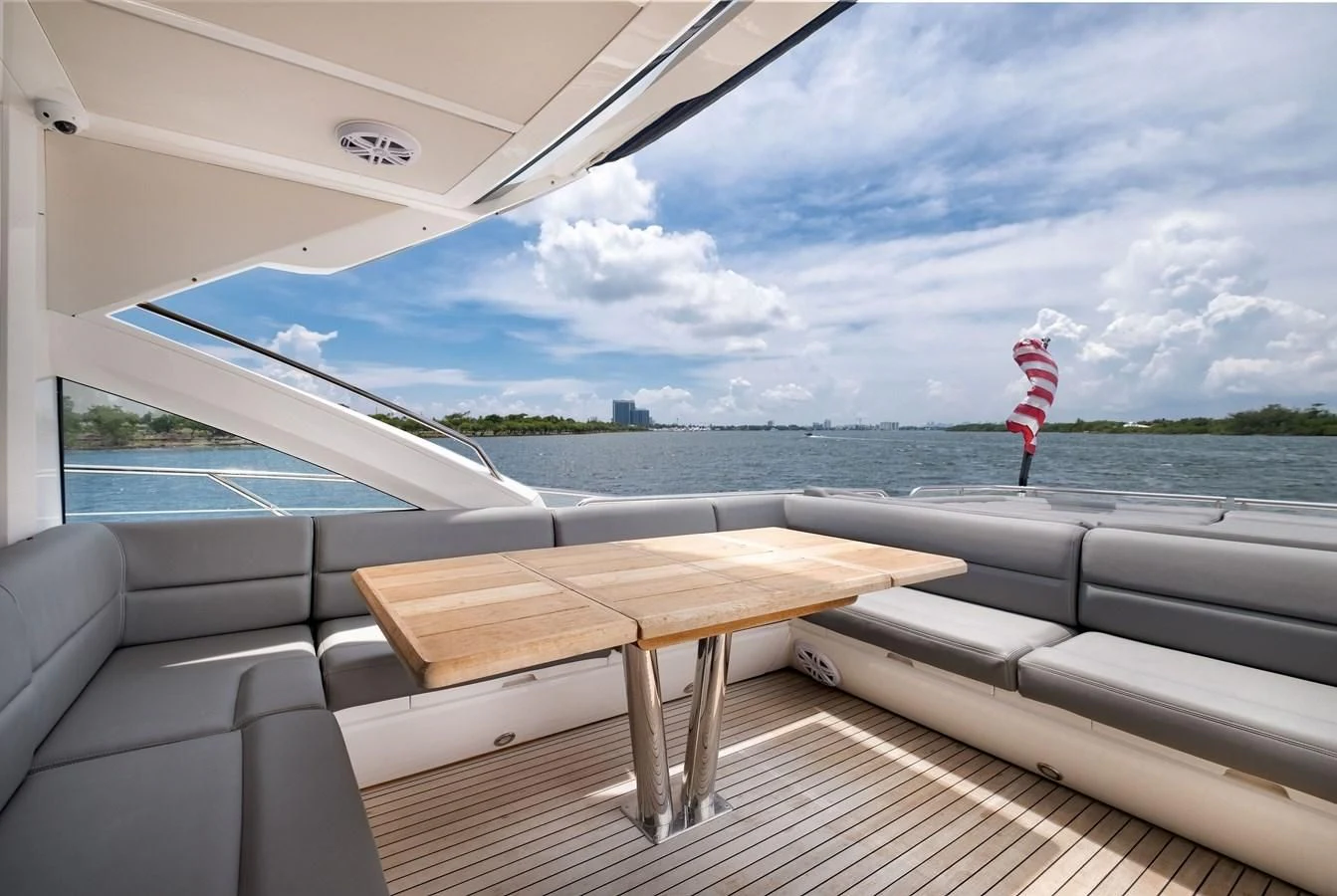 a boat on the water aboard SUNSEEKER PREDATOR 68 Yacht for Sale